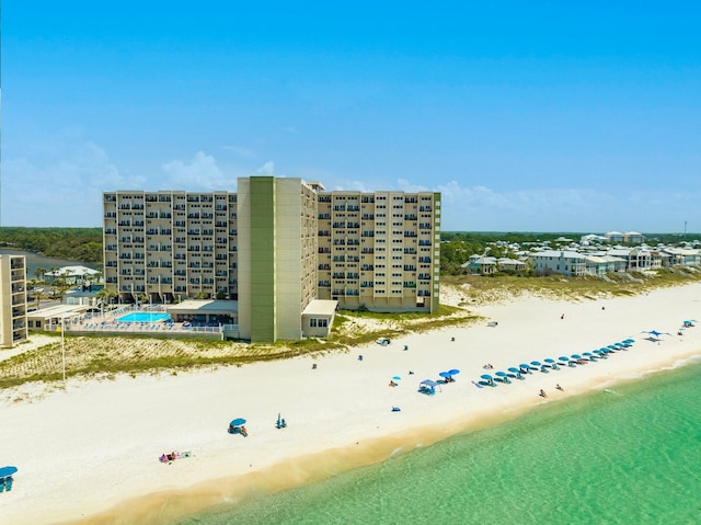 aerial view featuring a view of the beach and a water view