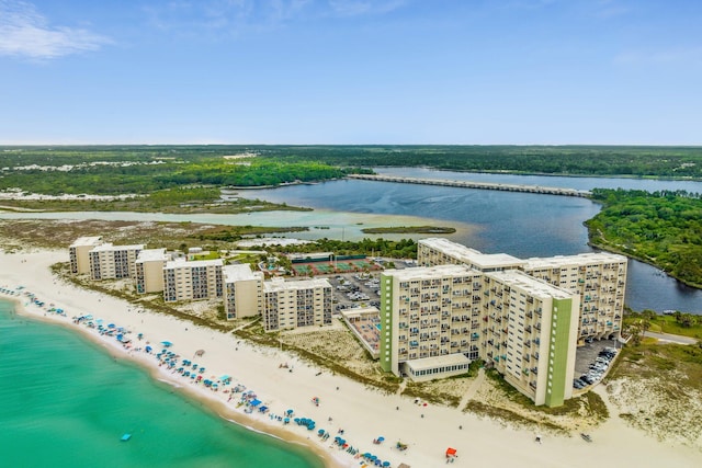 bird's eye view featuring a beach view and a water view