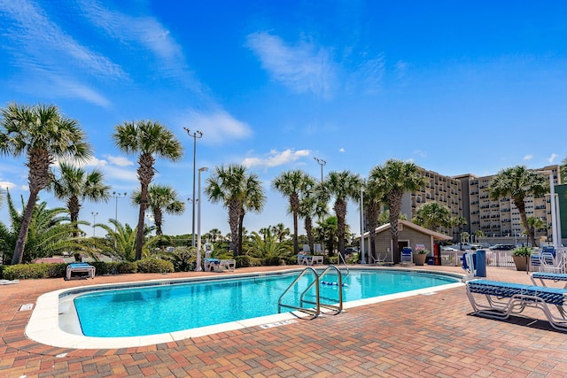 view of pool featuring a patio