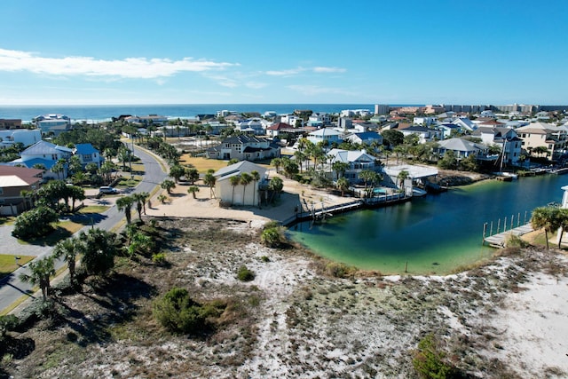 bird's eye view with a water view