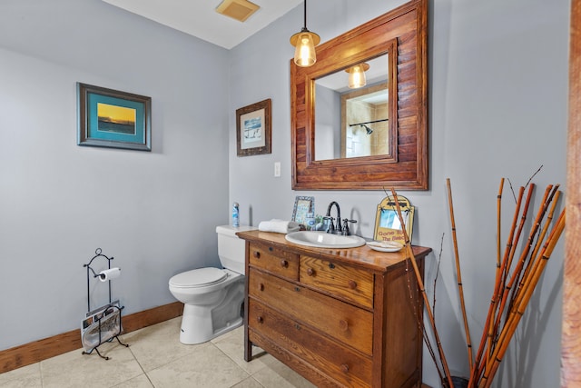 bathroom with oversized vanity, tile floors, and toilet