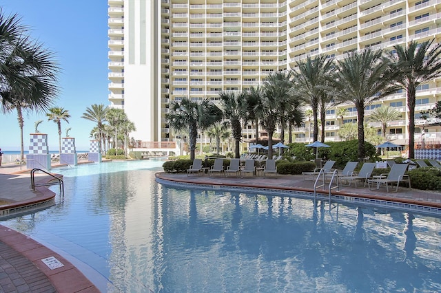 view of swimming pool featuring a patio