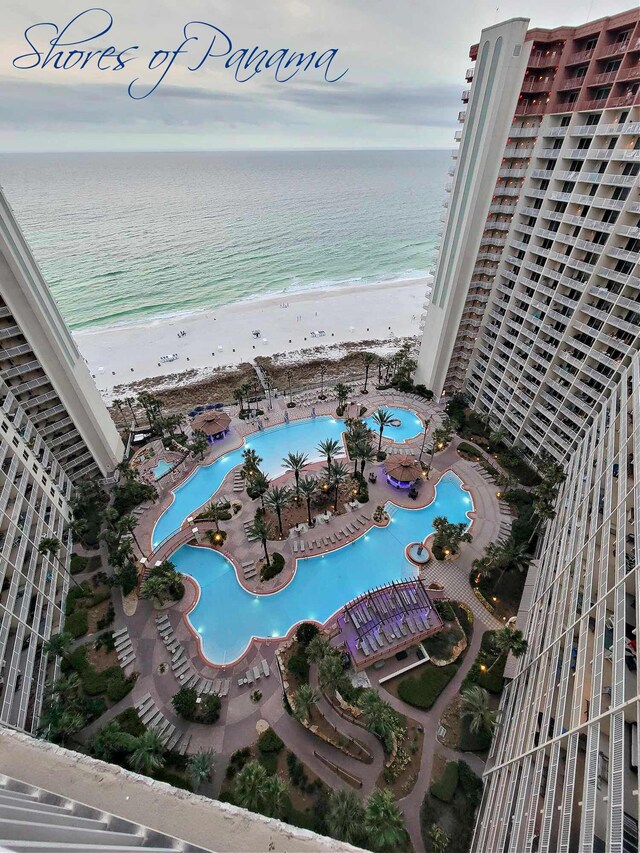 bird's eye view with a view of the beach and a water view