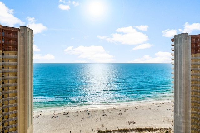 view of water feature with a beach view