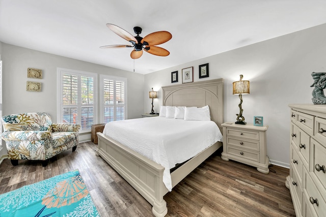 bedroom featuring ceiling fan and dark hardwood / wood-style flooring