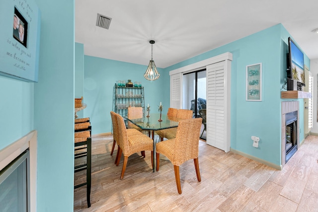 dining room with light hardwood / wood-style floors