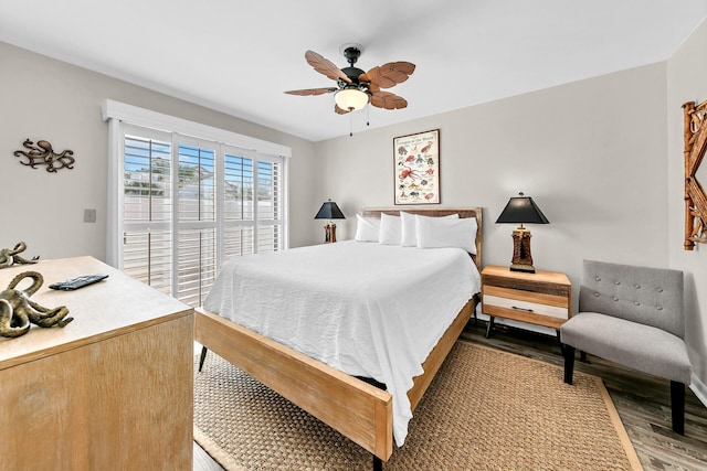 bedroom featuring light hardwood / wood-style floors and ceiling fan