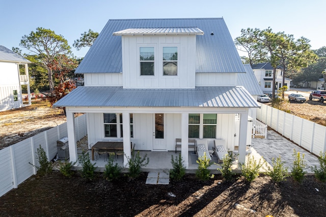 modern farmhouse with a porch