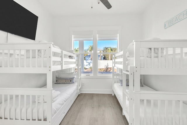 bedroom featuring light hardwood / wood-style flooring and ceiling fan