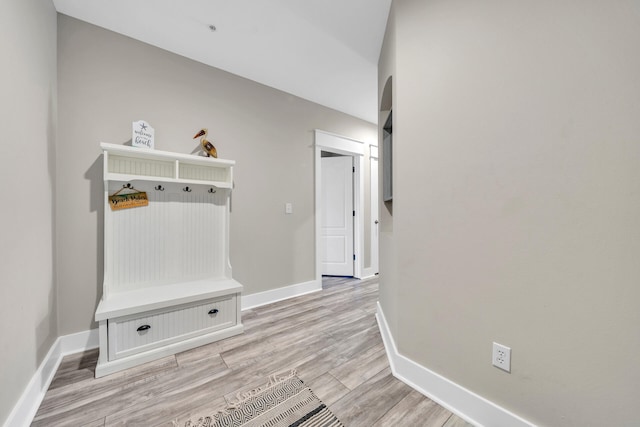 mudroom with light hardwood / wood-style flooring