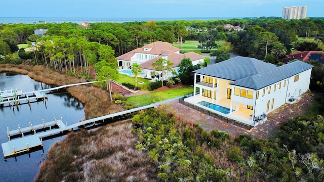 drone / aerial view with a water view