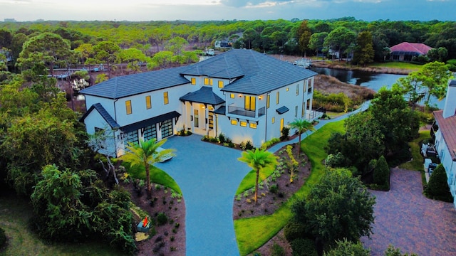 birds eye view of property featuring a water view