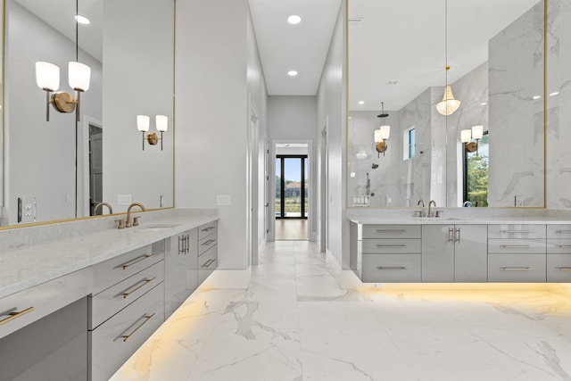 bathroom featuring vanity and a tile shower