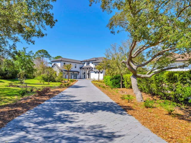 330 Kelly Plantation Dr, Destin, FL 32541 - view of front of property featuring stucco siding and decorative driveway