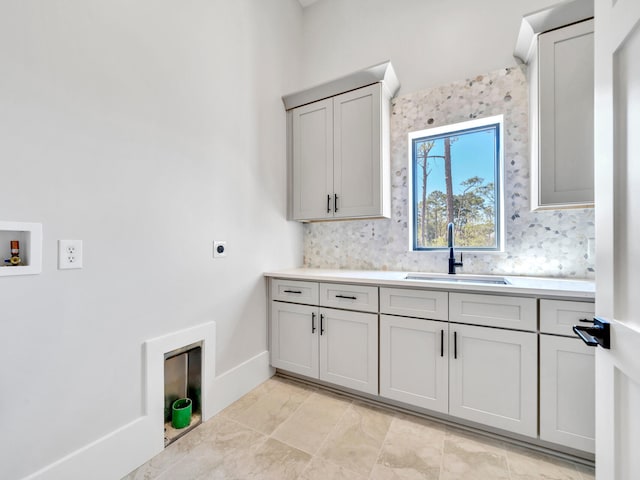 330 Kelly Plantation Dr, Destin, FL 32541 - laundry room featuring washer hookup, cabinet space, hookup for an electric dryer, and baseboards