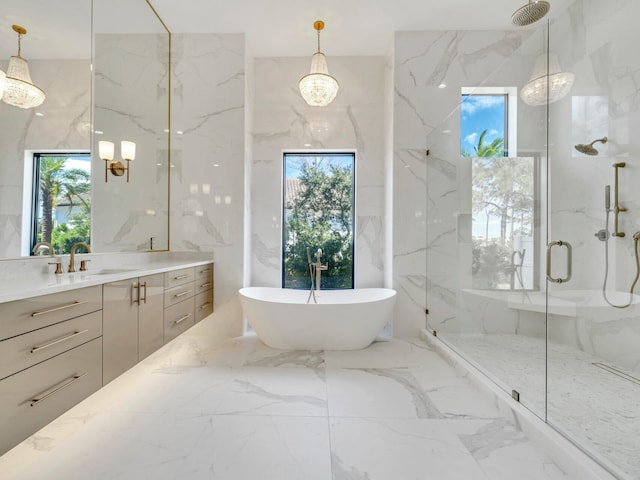 330 Kelly Plantation Dr, Destin, FL 32541 - bathroom featuring a chandelier, vanity, marble tiled flooring, a marble finish shower, and a soaking tub