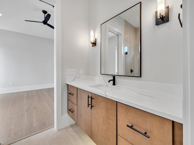 330 Kelly Plantation Dr, Destin, FL 32541 - bathroom with a ceiling fan, vanity, and baseboards