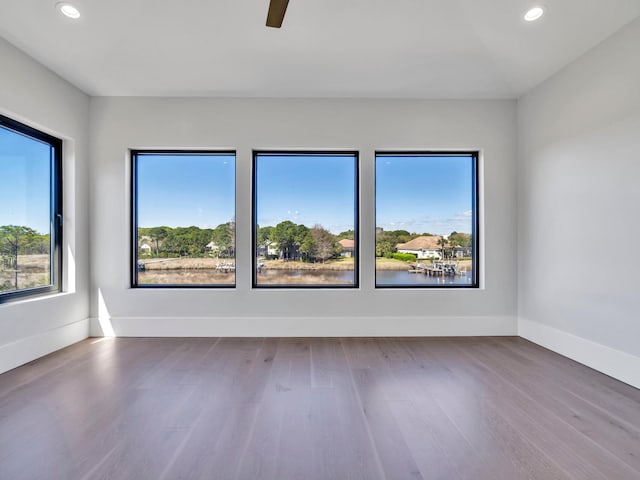 330 Kelly Plantation Dr, Destin, FL 32541 - unfurnished room with recessed lighting, wood finished floors, ceiling fan, and baseboards