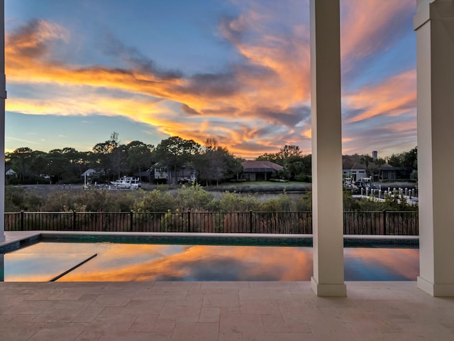 330 Kelly Plantation Dr, Destin, FL 32541 - pool at dusk with a patio