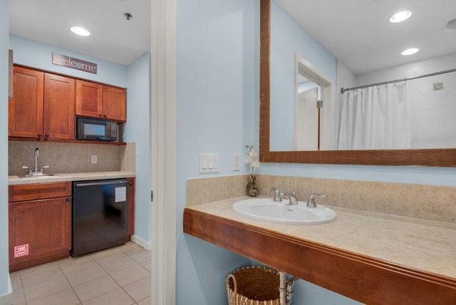 bathroom featuring backsplash, vanity, and tile flooring