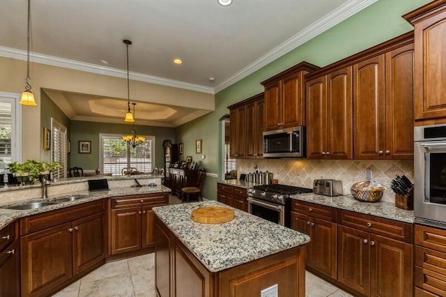 kitchen featuring stainless steel appliances, light tile flooring, light stone counters, pendant lighting, and a chandelier