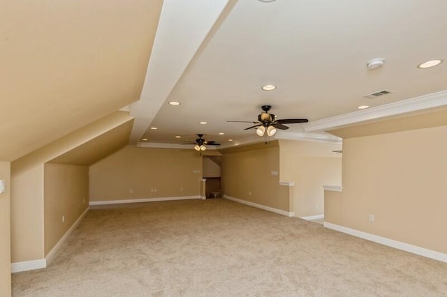 bonus room with light colored carpet, vaulted ceiling, and ceiling fan