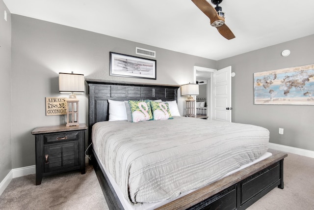 bedroom with ceiling fan and carpet floors