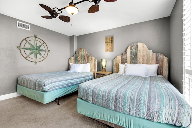 bedroom with light colored carpet and ceiling fan