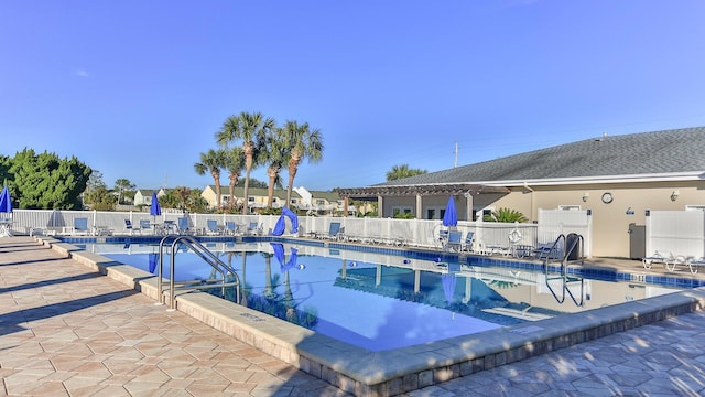 view of pool featuring a patio area