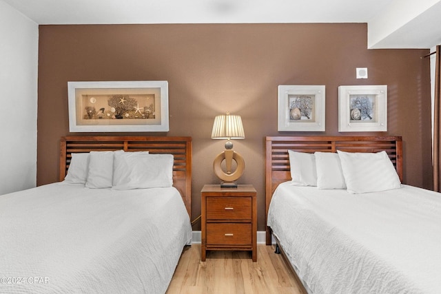 bedroom featuring light wood-type flooring