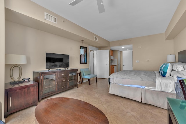 bedroom with ceiling fan and light tile floors