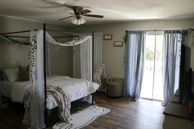 106 Star Dr Unit A, B, C, Fort Walton Beach, FL 32547 - bedroom featuring a textured ceiling, dark hardwood / wood-style flooring, ceiling fan, and access to exterior