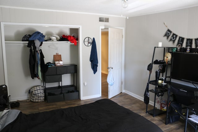 106 Star Dr Unit A, B, C, Fort Walton Beach, FL 32547 - bedroom featuring ornamental molding, a closet, and dark hardwood / wood-style floors