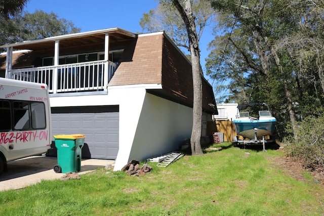 106 Star Dr Unit A, B, C, Fort Walton Beach, FL 32547 - view of home's exterior featuring a yard, a garage, and a balcony