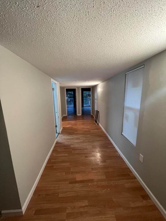 106 Star Dr Unit A, B, C, Fort Walton Beach, FL 32547 - hall with dark hardwood / wood-style floors and a textured ceiling