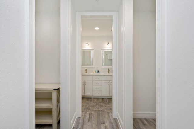 corridor featuring light hardwood / wood-style flooring