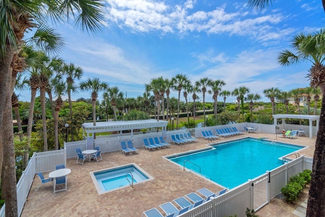 view of pool featuring a patio and a pergola