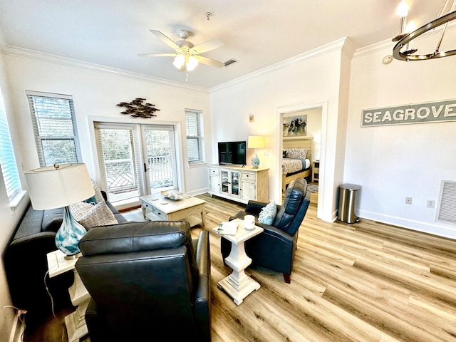 living room with french doors, ceiling fan, light wood-type flooring, and ornamental molding