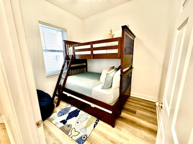 bedroom with light hardwood / wood-style flooring