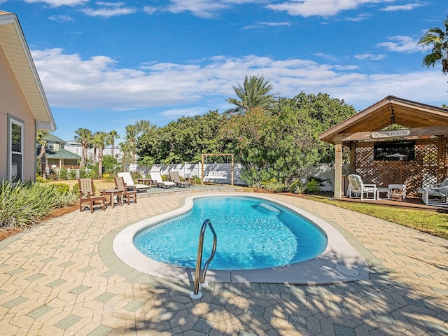 view of pool with a patio area and a gazebo