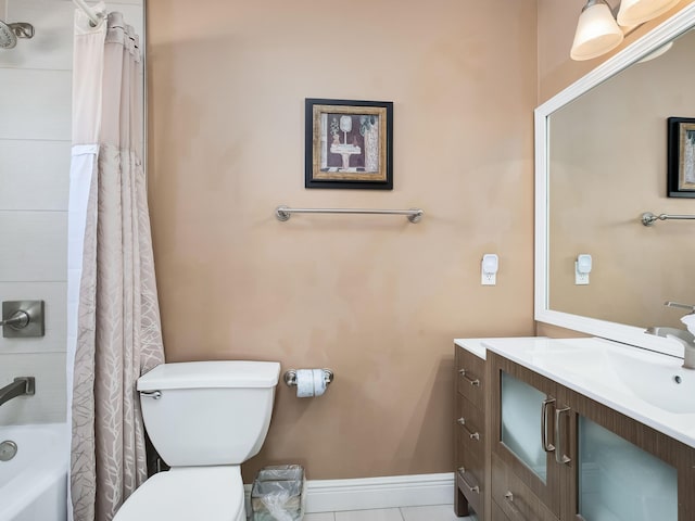 full bathroom featuring tile flooring, vanity, toilet, and shower / tub combo with curtain