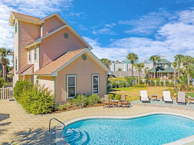 view of pool featuring a patio area