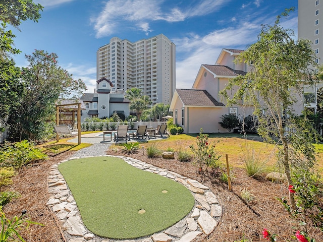 view of property's community with a patio area