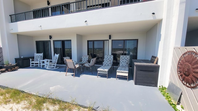 view of patio / terrace with a balcony