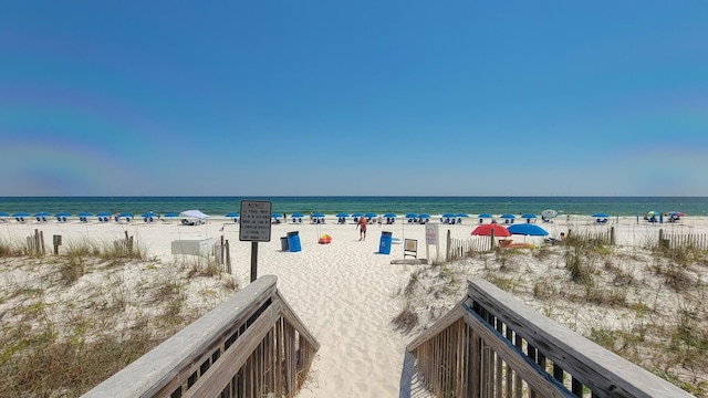 property view of water featuring a view of the beach