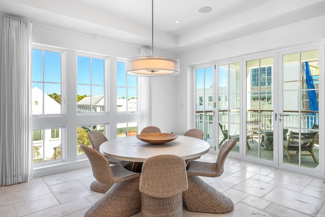 tiled dining room with french doors