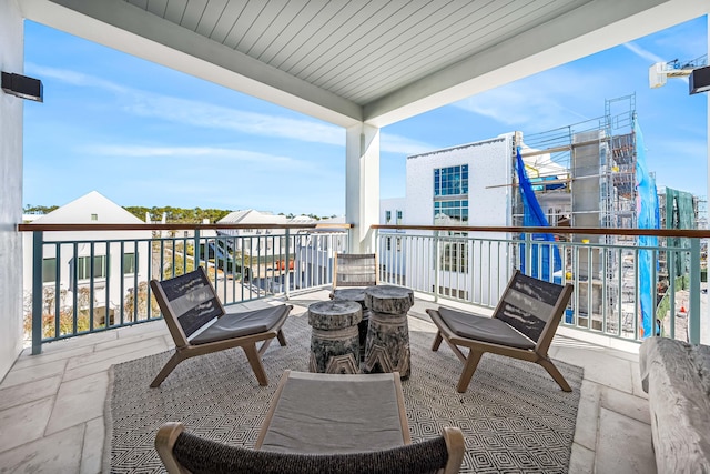 balcony with an outdoor fire pit