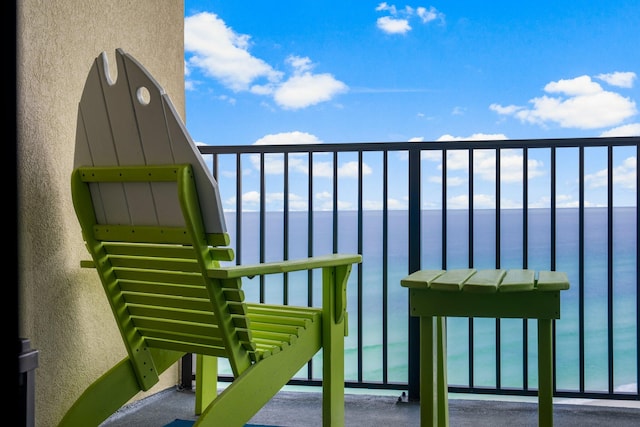 balcony featuring a water view