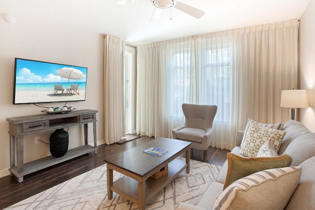 living room with light hardwood / wood-style floors and ceiling fan