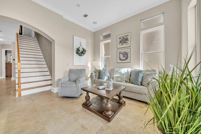 living room with ornamental molding